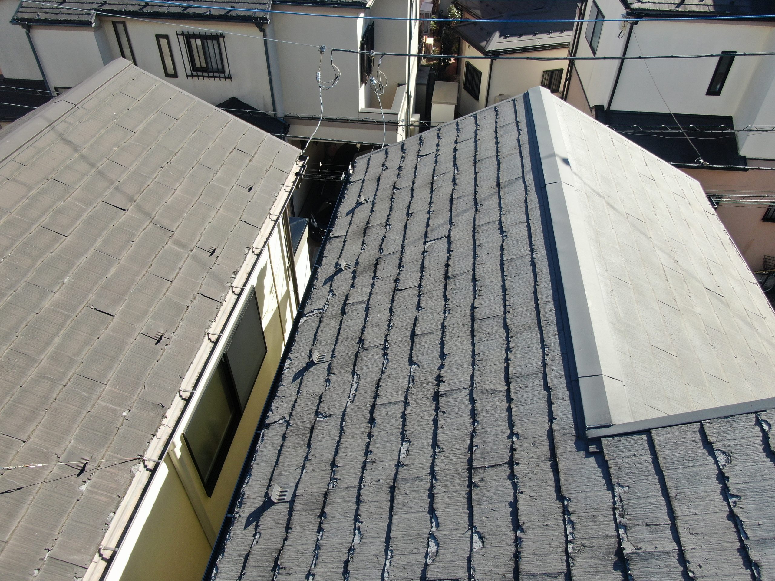 屋根上葺き工事の施工前の写真